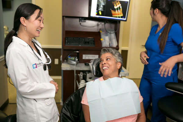 Staff atParkside Dental talking to a patient 