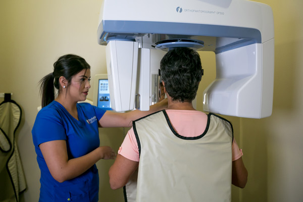 Woman getting her mouth xrayed