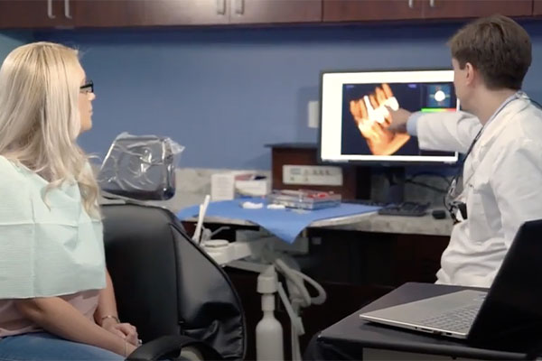 Woman getting dental exam