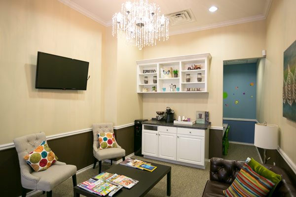 Waiting room with beverage station at Parkside Dental 