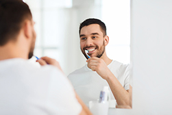 Why Do We Suggest Waiting a Half An Hour After Eating to Brush?